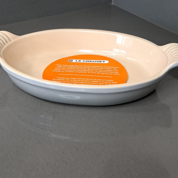 Le Creuset Oval Baker in Cream and White Stoneware